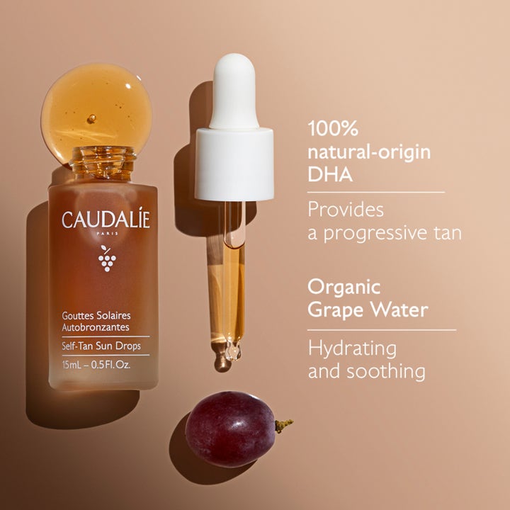 Caudalie Self-Tan Sun Drops 15 ml brun utan sol-droppar med naturlig DHA och druvvatten i glasflaska med vit pipett.