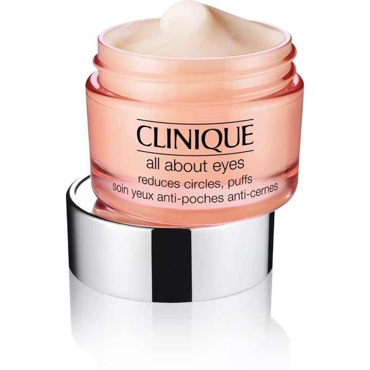 Clinique All About Eyes 30 ml ögonkräm mot mörka ringar i persikofärgad glasburk med synlig krämig textur.