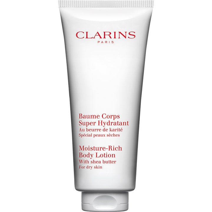 Clarins Moisture-Rich Body Lotion 200 ml fuktgivande kroppslotion med sheasmör i en vit tub med röd text