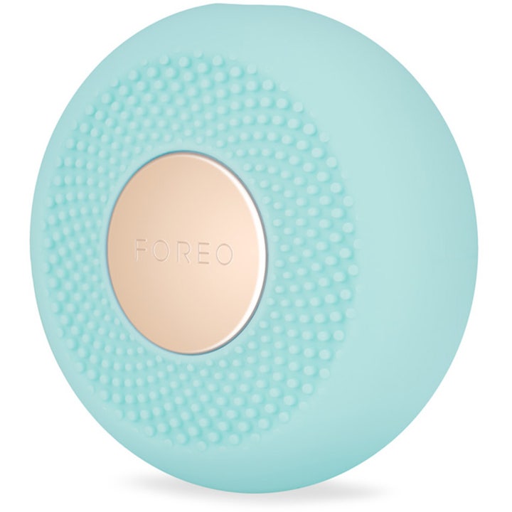 FOREO UFO mini 2 Mint ansiktsbehandling ger lyster med mintgrön silikonenhet och guldfärgad detalj