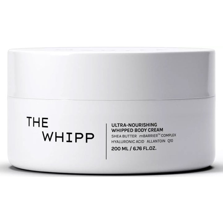 The Whipp Ultra-Nourishing Whipped Body Cream 200 ml närande kroppskräm med sheasmör i en minimalistisk vit burk.