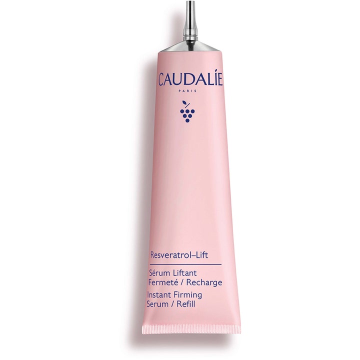Caudalie Resveratrol-Lift Instant Firming Serum 30 ml refill för ansiktet i en ljusrosa tub med silvrig kork