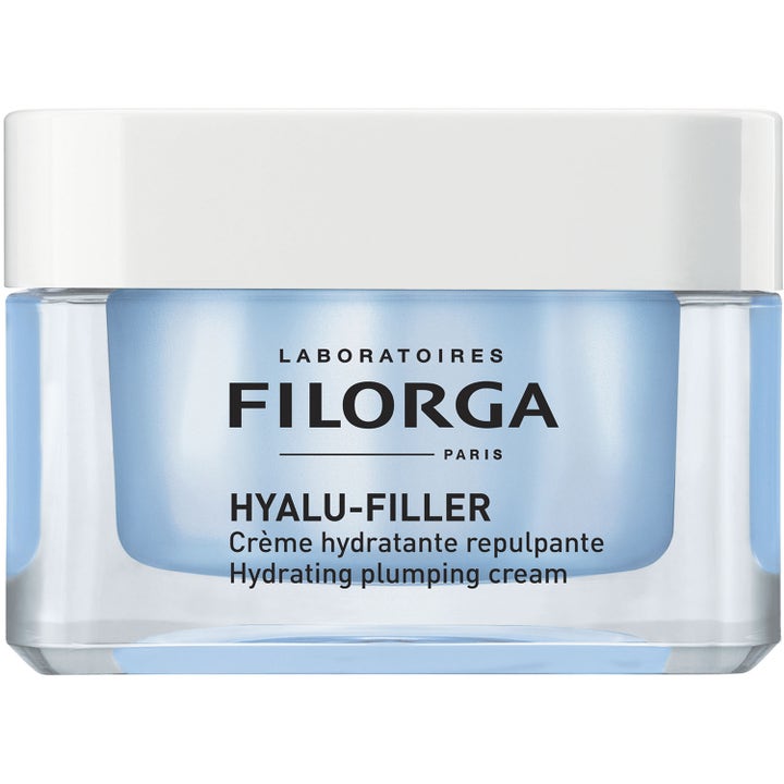 Filorga Hyalu-Filler Hydrating Plumping Cream återfuktande ansiktskräm i en glasburk med blått innehåll och vitt lock.