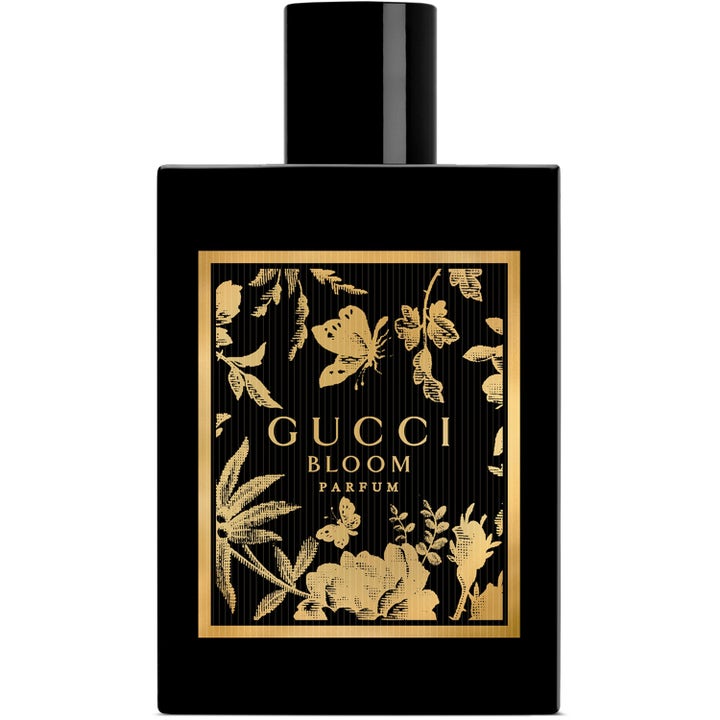 Gucci Bloom Parfum 100 ml elegant parfym i en svart rektangulär glasflaska med gulddekor av blommor och fjärilar