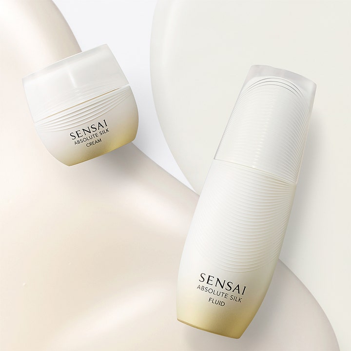 Sensai Absolute Silk Fluid 80 ml återfuktande ansiktskräm i vit pärlemorskimrande flaska