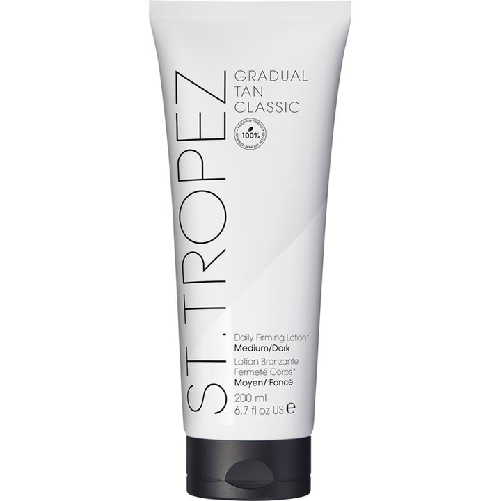 St Tropez Gradual Tan Body Lotion 200 ml brun utan sol för kroppen i vit tub med svart lock som ger huden fasthet
