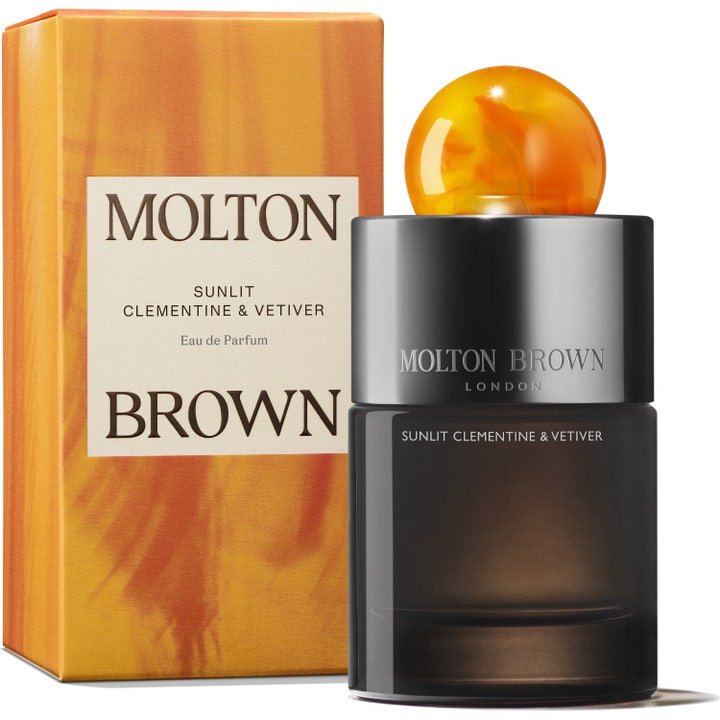 Molton Brown Sunlit Clementine & Vetiver 100 ml citrus vetiver eau de parfum i mörk flaska med orange marmorerad kork och box