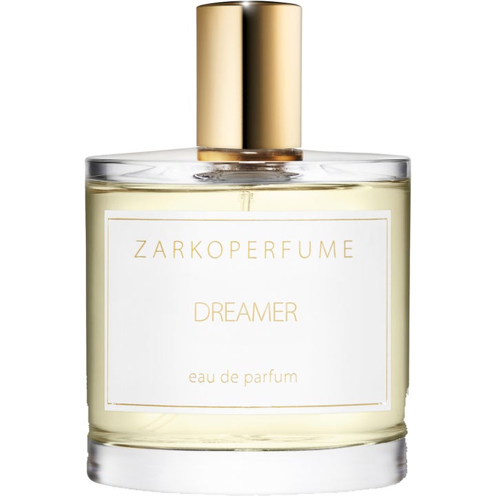 Zarkoperfume Dreamer 100 ml parfym i en elegant cylinderformad glasflaska med glänsande guldkork och ljusgul vätska