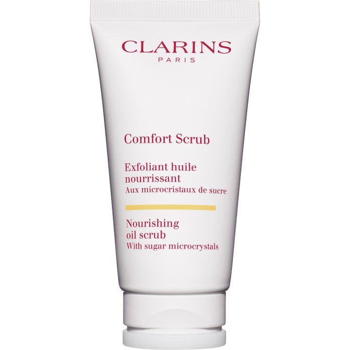 Clarins Comfort Scrub närande ansiktsskrubb i vit tub ger lyster och mjukhet med exfolierande sockerkristaller