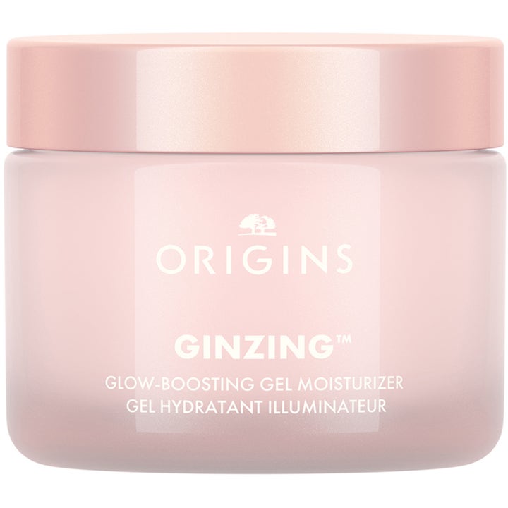 Origins GinZing Glow-Boosting Gel Moisturizer energigivande glowkräm med ginseng i en frostad ljusrosa glasburk.