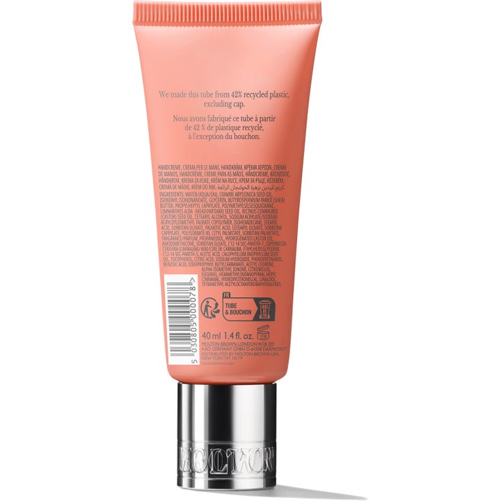 Molton Brown Heavenly Gingerlily Hand Cream 40 ml återfuktande parfymerad handkräm i korallfärgad tub med silverlock