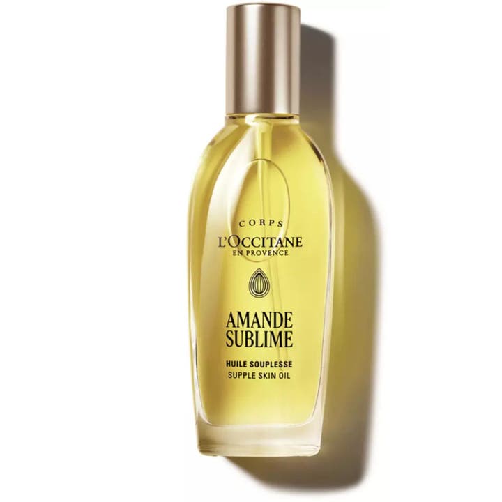 L'Occitane Amande Supple Skin Oil 100 ml 48h fuktgivande kroppsolja i glasflaska med spraypump och gyllene olja