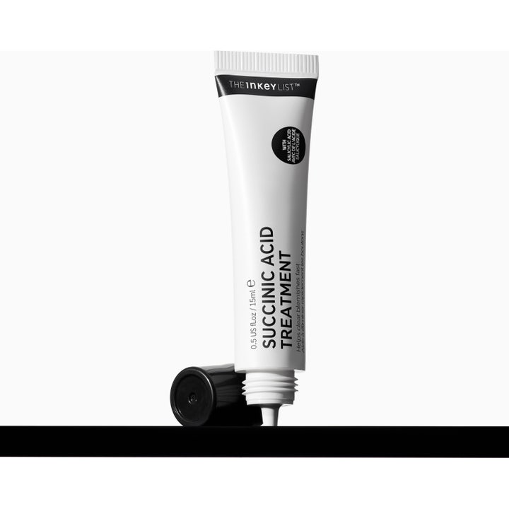 The INKEY List Succinic Acid Treatment 15 ml punktbehandling finnar i vit tub med svart lock och ytterkartong