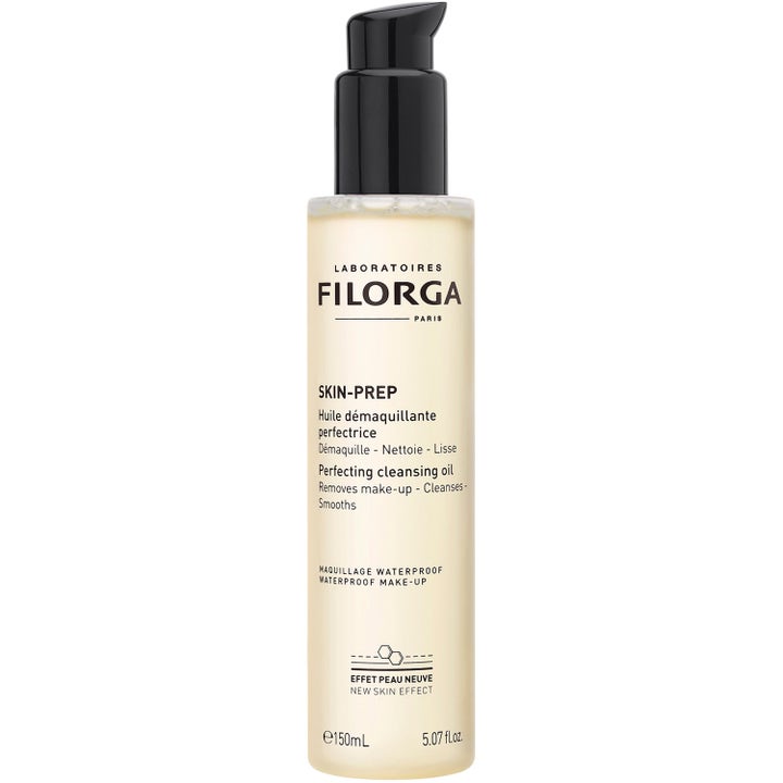 Filorga Skin-Prep Perfecting Cleansing Oil 150 ml rengöringsolja i en genomskinlig plastflaska med svart pump.