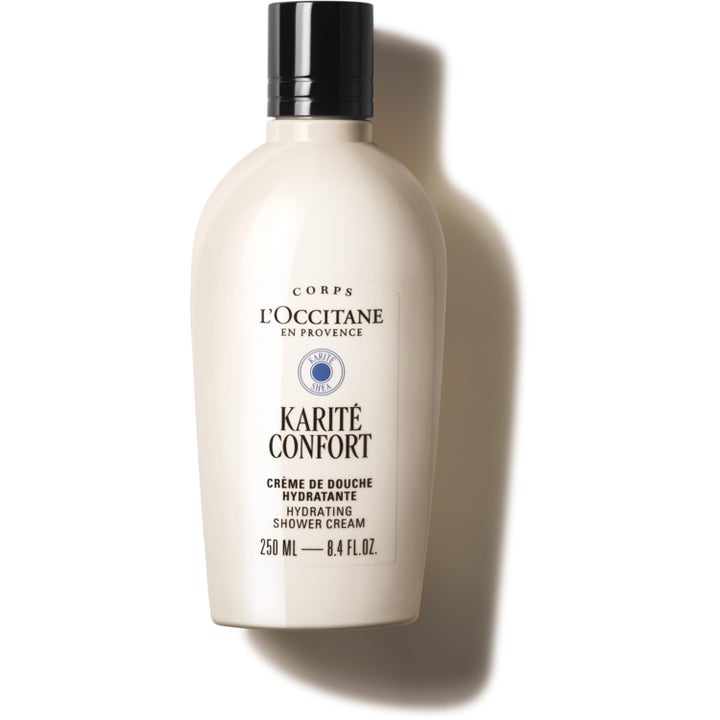 L'Occitane Karité Confort 250 ml fuktgivande duschkräm för känslig hud i en krämvit flaska med svart lock.