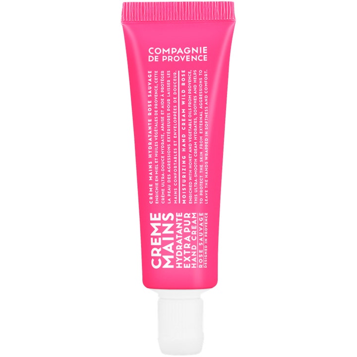 Compagnie de Provence handkräm 30 ml med vildros är en naturlig kräm i en ceriserosa tub som ger huden fukt och lyster.