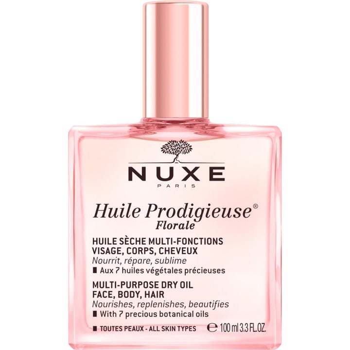 Nuxe Huile Prodigieuse Florale 100 ml vårdande ansiktsolja torr hud och hårolja spray i en rosa glasflaska med lös kork