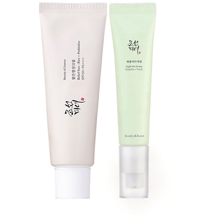 Beauty of Joseon Relief Sun och Light On Serum ger solskydd och lyster i en vit tub och en ljusgrön tub med pump.