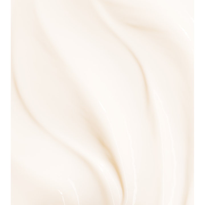 Biotherm Baume Corps Oil Therapy 400 ml kroppslotion ger intensiv återfuktning med en mjuk krämig persikofärgad textur.
