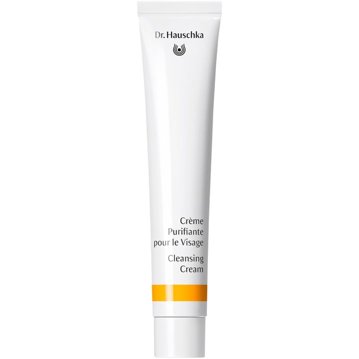 Dr. Hauschka rengöringskräm naturlig ansiktsrengöring i vit tub med gul rand som rengör skonsamt och ger lyster