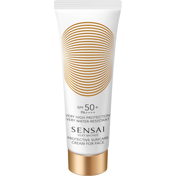 Sensai Silky Bronze Protective Suncare Cream For Face SPF 50+ premium solkräm ansikte ger högt skydd i vit tub med guldlock.
