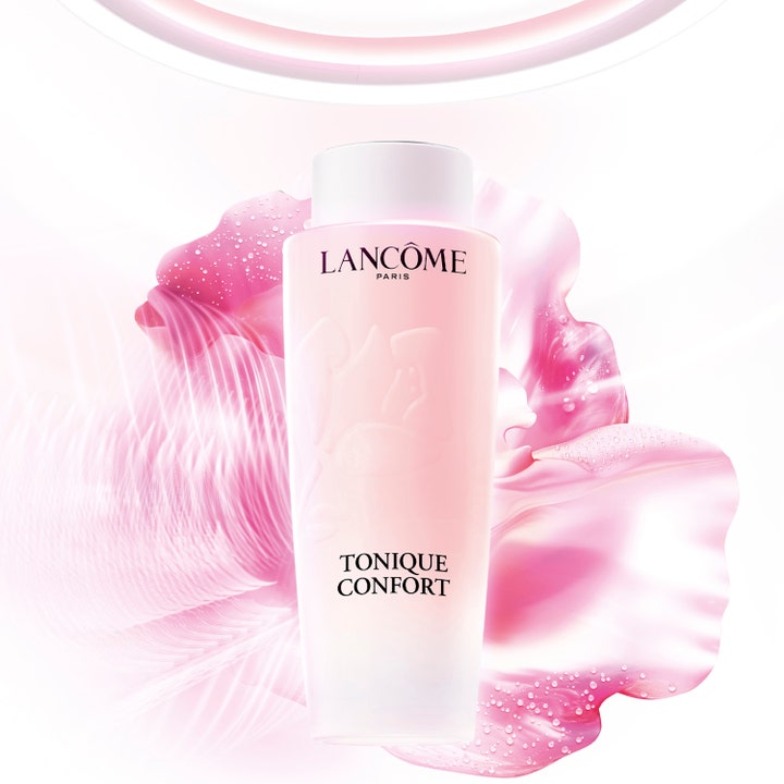 Lancôme Tonique Confort 200 ml återfuktande ansiktsvatten i rosa flaska mot blommig bakgrund