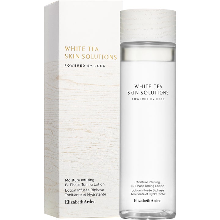 Elizabeth Arden White Tea Skin Solutions 200 ml återfuktande toner i klar flaska med vitt träliknande lock och box.