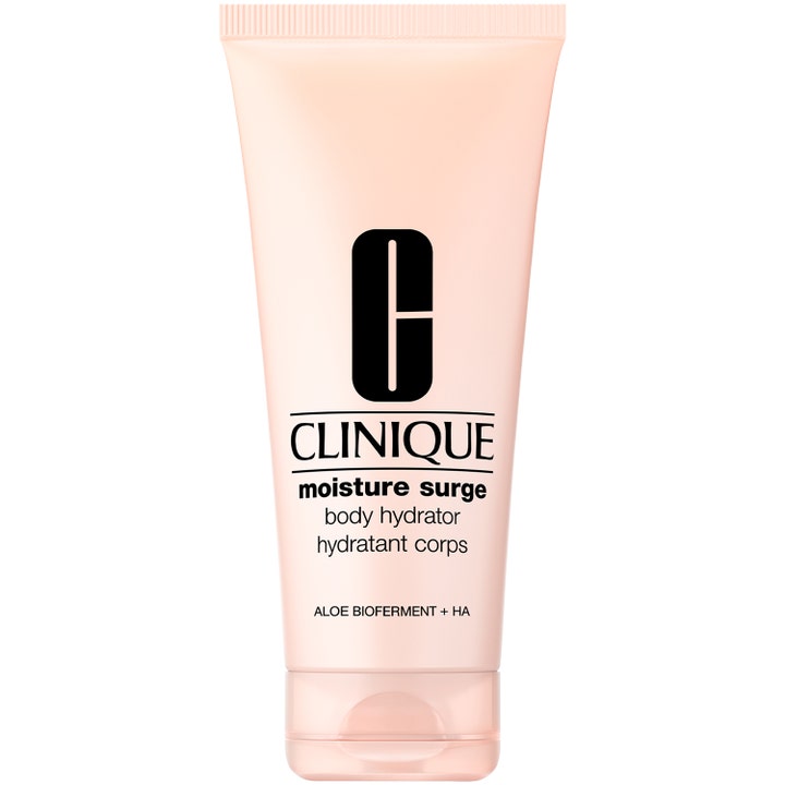 Clinique Moisture Surge Body Hydrator återfuktande aloe kroppskräm för torr hud i en ljusrosa plasttub.