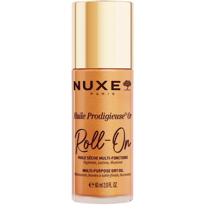 Nuxe Huile Prodigieuse Or Roll-On 60 ml guldolja ansiktsolja ger lyster i en glimmande flaska med guldlock.