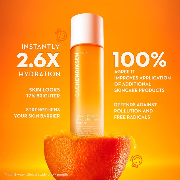 Ole Henriksen Truth Barrier Booster Orange Ferment Essence 118 ml i orange flaska på en halv apelsin.