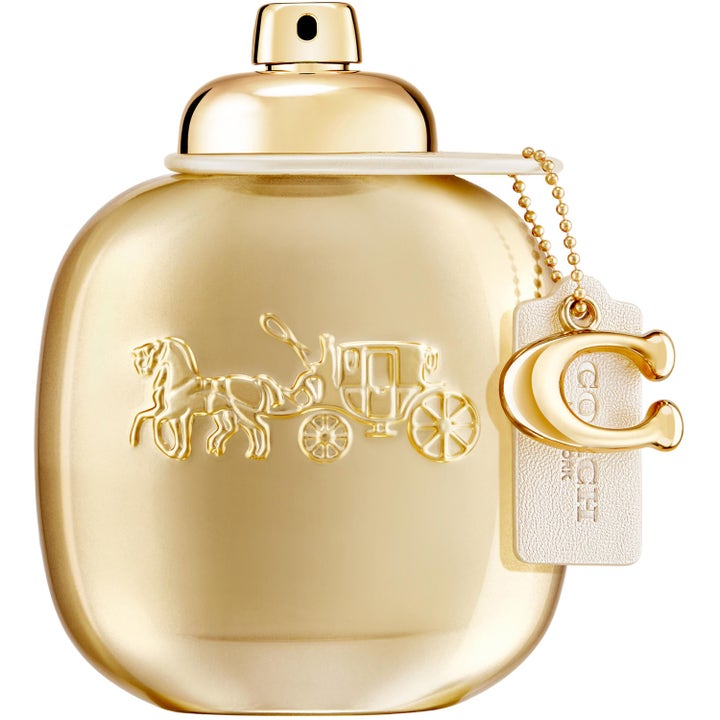 Coach Woman Gold Eau de Parfum 90 ml parfym i guldmetallisk flaska med hästlogotyp och en guldig berlock