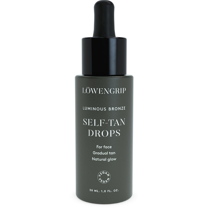 Löwengrip Luminous Bronze Self-Tan Drops 30 ml brun utan sol droppar för känslig hud i mörkgrön matt flaska med pipett.