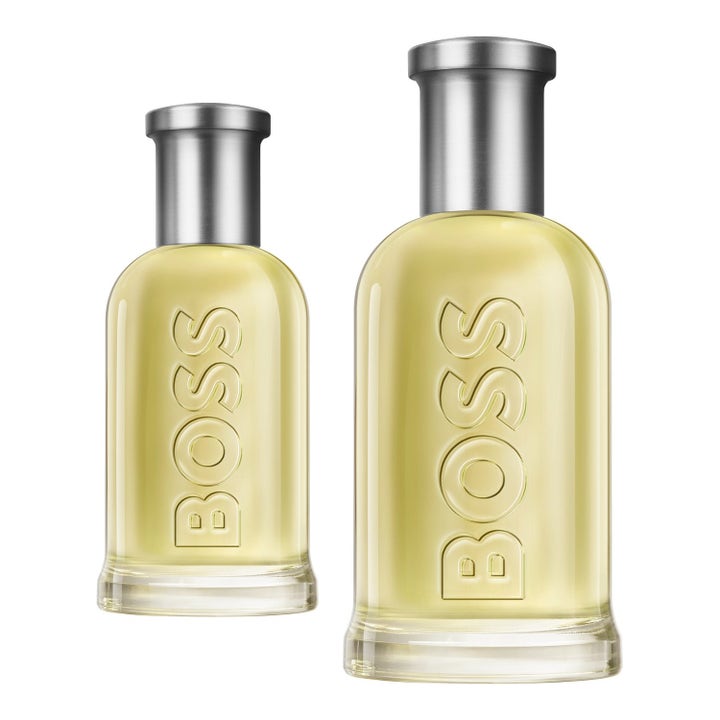 Hugo Boss Boss Bottled 100 ml och 150 ml eau de toilette parfym i två glasflaskor med ljusgul vätska och silverlock