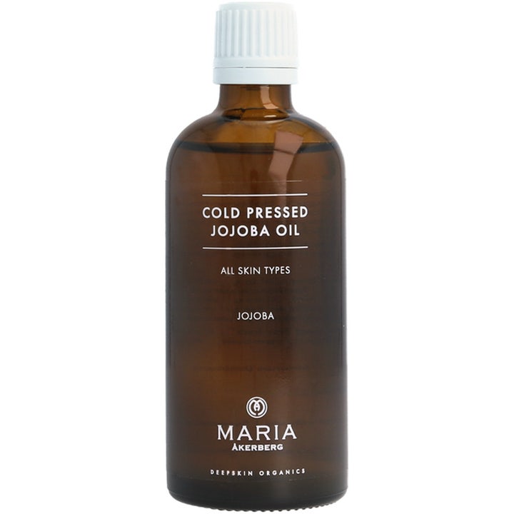 Maria Åkerberg Cold Pressed Jojoba Oil 100 ml återfuktande olja i brun glasflaska med vitt skruvlock som ger mjuk hud