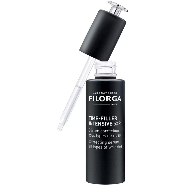 FILORGA Time-Filler Intensive 5XP 30 ml serum mot rynkor i svart flaska med silverdetaljer och lyft glaspipett