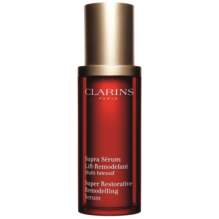 Clarins Super Restorative Remodelling Serum 30 ml lyftserum i röd glasflaska med guldlock ger fasthet.