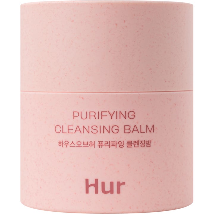 Hur Purifying Cleansing Balm djuprengörande ansiktsrengöring i en ljusrosa burk med melerad textur och lock