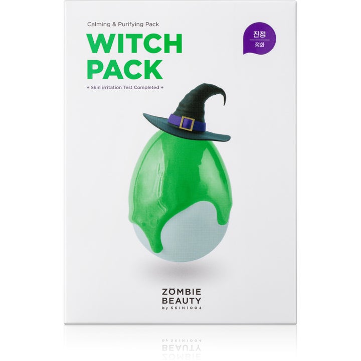 Zombie Beauty Witch Pack lugnande ansiktsmask i vit box med grafik av en grön klick som bär en svart häxhatt.