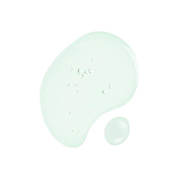 SKIN1004 Madagascar Centella Tea-Trica Relief Ampoule 100 ml cica serum lugnar akne irriterad hud med en ljusgrön textur.