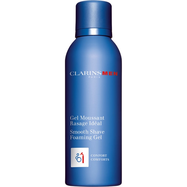 ClarinsMen Smooth Shave Foaming Gel 150 ml mjukgörande gel för rakning i en matt blå sprayflaska med mörkblått lock