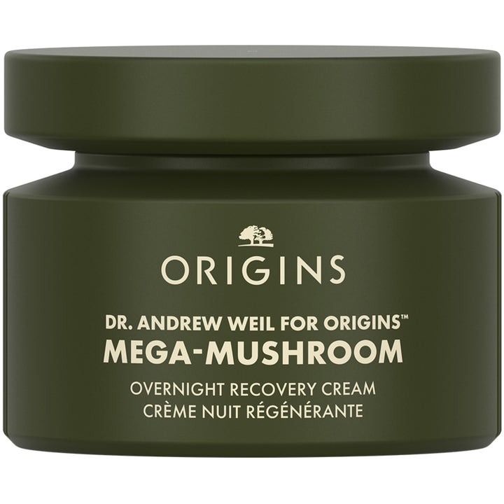 Origins Mega-Mushroom Overnight Recovery Cream lugnande nattkräm i en mörkgrön matt glasburk som återhämtar huden.