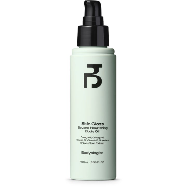 Bodyologist Skin Gloss Body Oil 100 ml närande kroppsolja i mintgrön flaska med svart pump och omega-fettsyror.