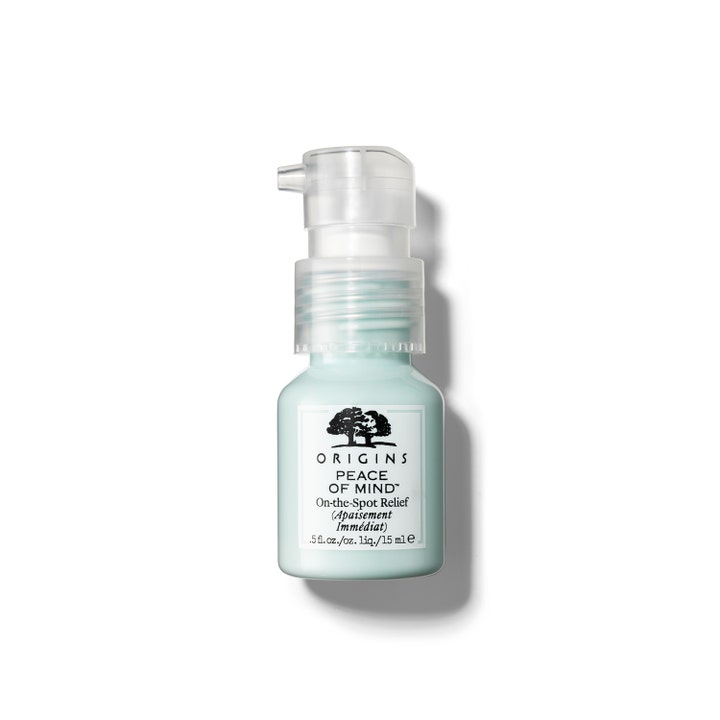 Origins Peace of Mind 15 ml Origins punktbehandling ger avslappning i en ljusblå flaska med genomskinlig pump.