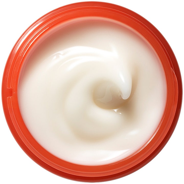 Origins Ginzing Energizing Gel Face Cream 50 ml ansiktsgel med koffein visar en vit krämig textur i en orange burk.