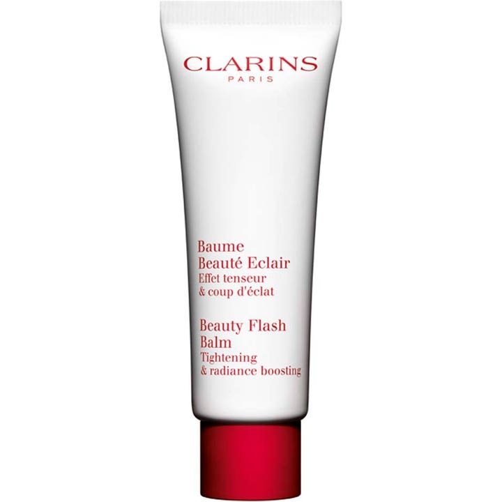 Clarins Beauty Flash Balm lysterkräm ger en intensiv uppstramande ansiktsbehandling i en vit tub med rött lock.