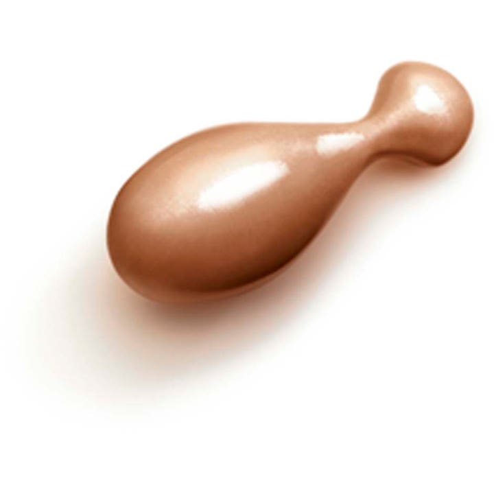 Clarins Milky Boost Capsules 06 7,8 ml lystergivande serum i form av en skimrande bronsfärgad kapsel