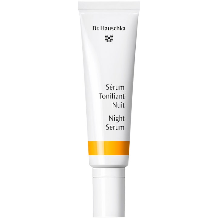 Dr. Hauschka Night Serum 20 ml fuktgivande nattserum i vit tub med orange detalj för hudens förnyelse.