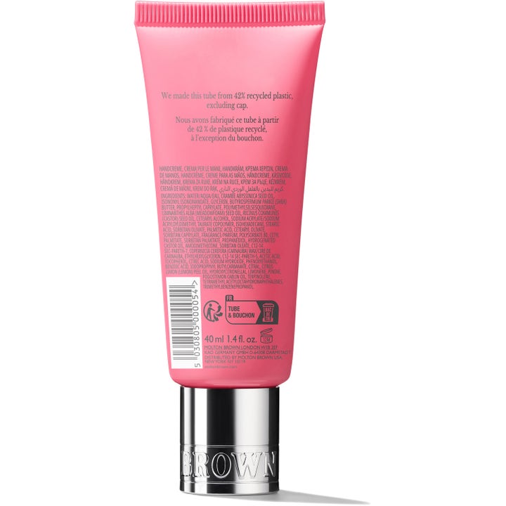 Molton Brown Fiery Pink Pepper handkräm 40 ml är en handkräm med kryddig doft i en rosa tub med silverfärgat lock.