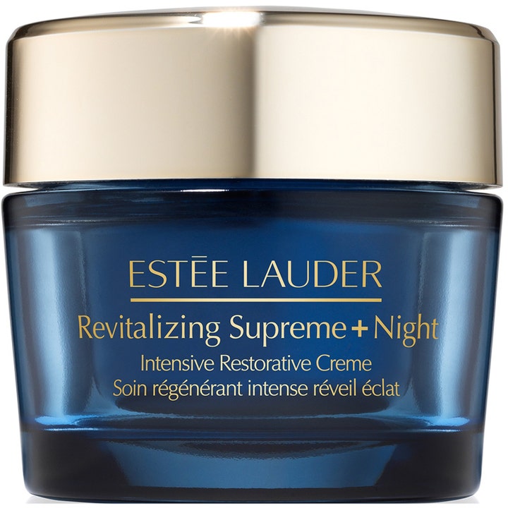 Estée Lauder Revitalizing Supreme+ Night återfuktande nattkräm premium i en mörkblå glasburk med guldlock