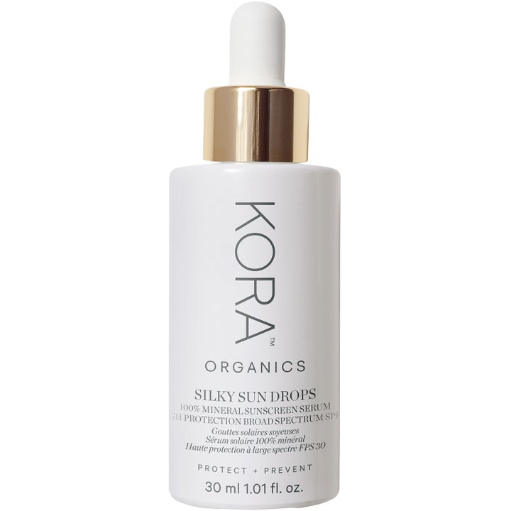 KORA Organics Silky Sun Drops 30 ml ekologisk solkräm spf 30 som skyddar huden i vit flaska med pipett och guldkork